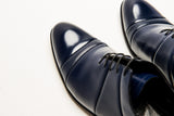 Blue patent leather oxford shoes