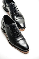 Black leather oxford cap toe shoes