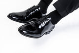 Patent leather black wholecut brogue shoes