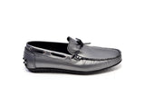 Grey patent leather driving moccasins with leather piping and bow tassels