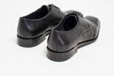 Black leather derby shoes