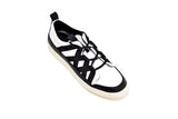 Black and white leather plimsolls