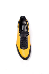 Black and yellow leather sneakers